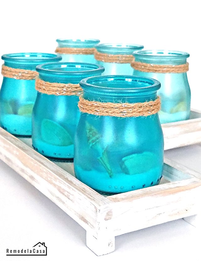 These super cute votives have the most gorgeous color for a coastal style. 